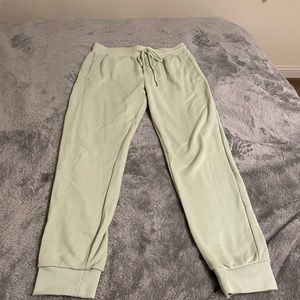 Green sweatpants